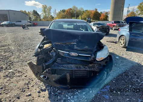 2012 Ford Focus Se z USA, uszkodzony, nr VIN 1FAHP3F2XCL311582